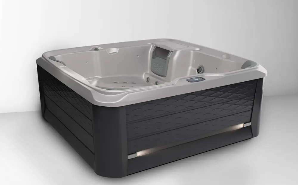 Sundance® Ramona® hot tub, installed in a backyard