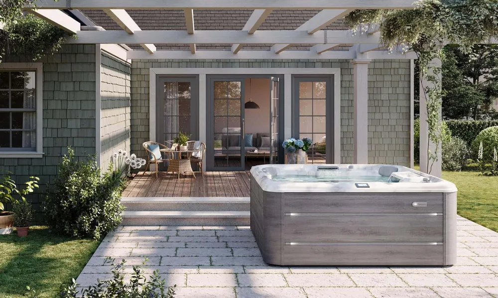 Sundance® Chelsee® hot tub, installed in a backyard