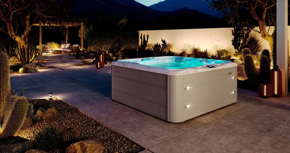 Sundance® Hamilton™ hot tub, installed in a backyard