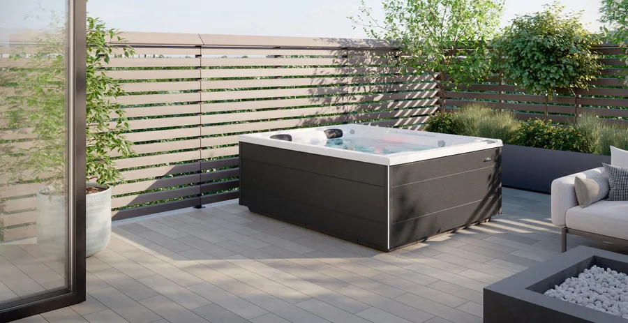 Jacuzzi® J404L installed in a backyard